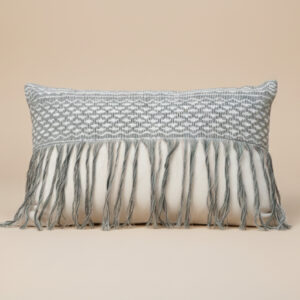 Cojines gris–azul con acentos tejidos