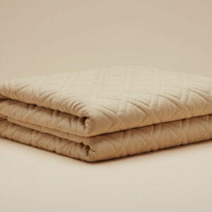 Mantel acolchado en algodón con caminos de mesa en lino